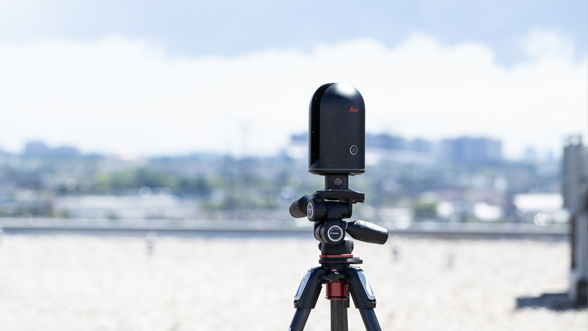 A Leica Geosytems BLK360 Laser Scanner on top of a building in Toronto, Canada.
