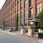 Toronto Carpet Factory 3D Scan Beautiful building facade with a RTC360 laser scanner positioned outside.